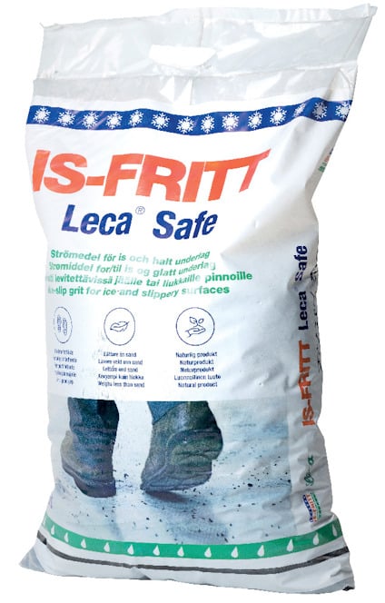 Säck med IS-FRITT Leca Safe, visar illustration av fötter på is med snöflingor och text om halkskydd på olika språk.