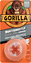 Förpackning med dubbelhäftande monterings tejp från Gorilla, med en illustration av en gorilla och orange bakgrund.