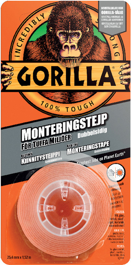 Förpackning med dubbelhäftande monterings tejp från Gorilla, med en illustration av en gorilla och orange bakgrund.