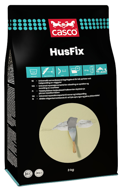 Förpackning av väggspackel Casco HusFix 3 kg med illustration av spackelverktyg och vägg.