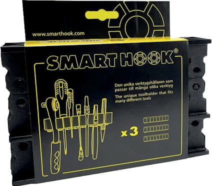 Förpackning med svart SmartHook verktygshållare, illustration av verktyg och text på svenska och engelska.