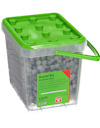 Plastburk med grön lock innehållande spik, etiketttext: "Grooved Nail" och flera översättningar samt dimensioner 4,3x125.