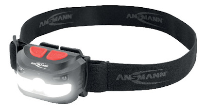 Pannlampa med svart band, vit och röd ljusknapp, märkt "Ansmann".